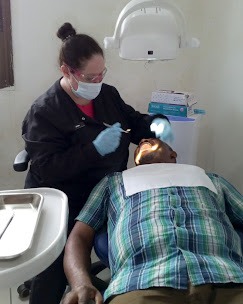 dr liwo dental clinic at work